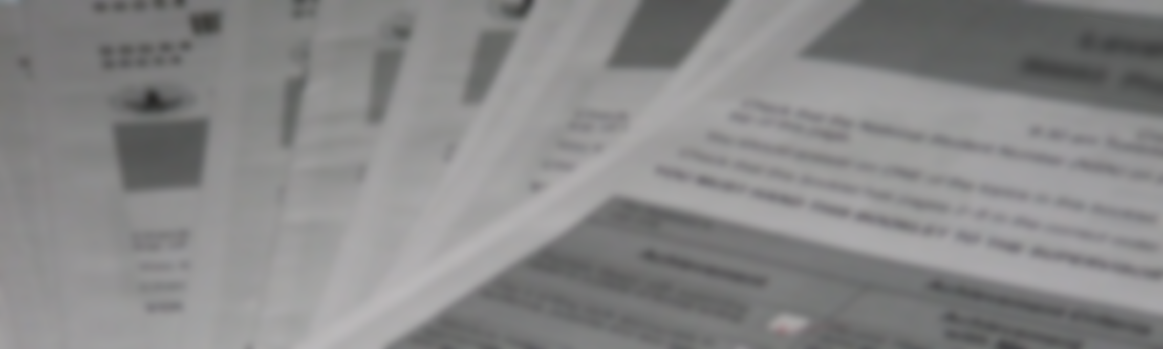 Documents. Source: https://commons.wikimedia.org/wiki/File:NCEA_exam_papers.JPG